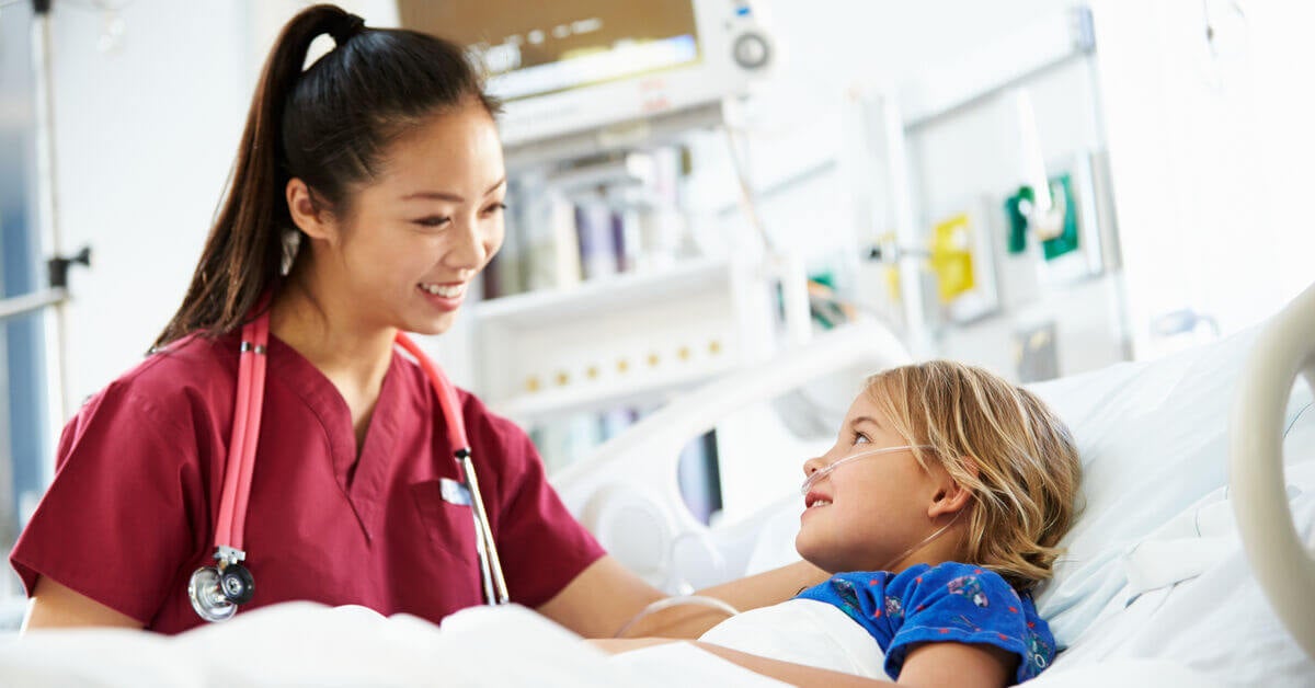 nurse with a pediatric patient