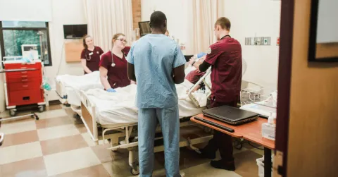 nursing students in the sim lab